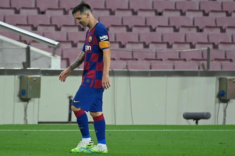 Lionel Messi walks off the pitch at the end of the match. AFP