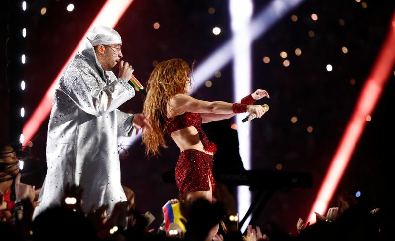 epa08189430 Colombian singer Shakira (R) and Puerto Ricans singer Bad Bunny (L) performs during halftime of the National Football League's Super Bowl LIV at Hard Rock Stadium in Miami Gardens, Florida, USA, 02 February 2020.  EPA-EFE/LARRY W. SMITH