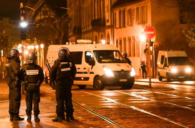 Police stand in the streets of Strasbourg. AFP