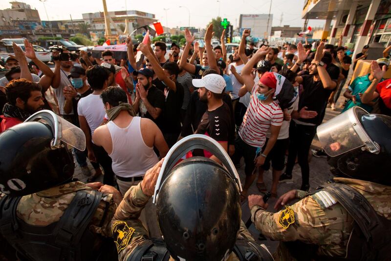 Iraqi protesters in Basra.  AFP