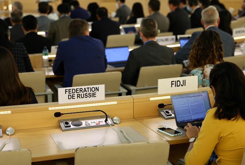The seat for the representative of Russia sits empty during a Human Rights Council special session. Reuters