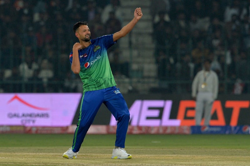 Multan Sultans fast bowler Ihsanullah celebrates the wicket of Lahore Qalandars' Kamran Ghulam during the PSL match at Multan Cricket Stadium on February 13, 2023. AFP