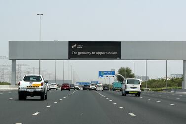 Electronic traffic signs advertise the Salik IPO scheme in Dubai. Pawan Singh / The National