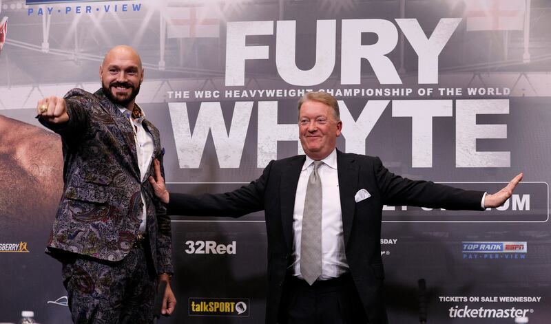 Tyson Fury and promoter Frank Warren at Wembley. Reuters 