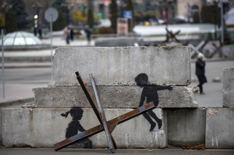 Street art on concrete blocks in Maidan Nezhalezhnosti Square, Kyiv. EPA