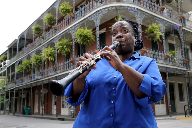 Musician Doreen Ketchens plays her clarinet at the corner of St. Peter and Royal streets in the French Quarter of New Orleans. AP Photo