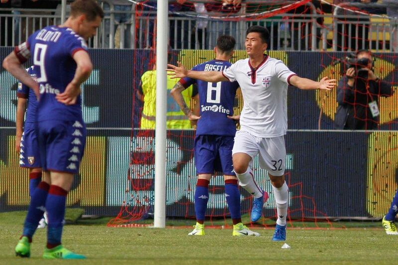 Cagliari's Han Kwang-song, right, celebrates after scoring a goal during the Italian Serie A match against Torino, at the Sant'Elia stadium in Cagliari, Italy, Sunday, April 9, 2017. Fabio Murru / AP Photo