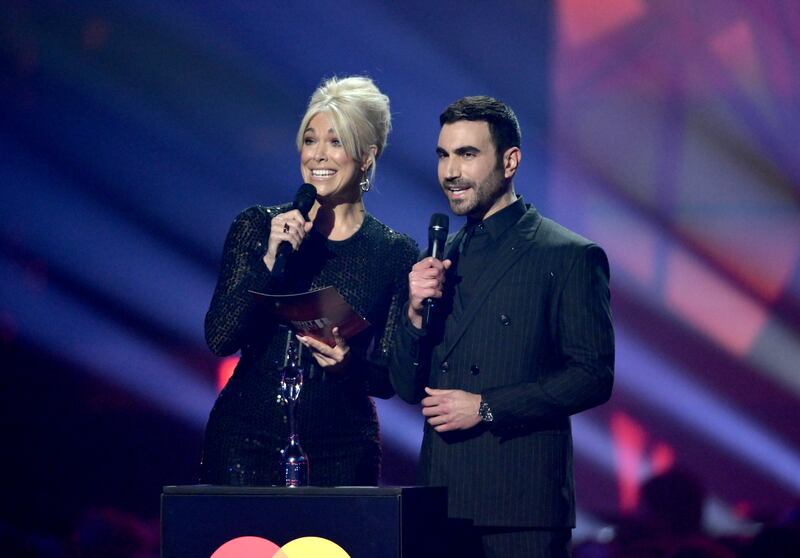 Hannah Waddingham and Brett Goldstein present the award for Song of the Year. Getty Images