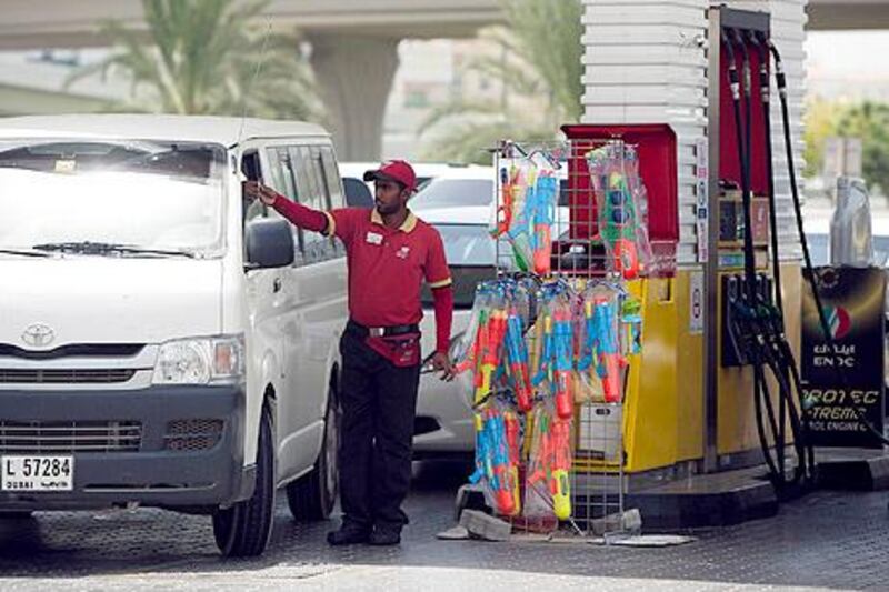 DUBAI, UNITED ARAB EMIRATES – June 8, 2011:  Customers refuel at an Eppco station in Dubai Festival City.  Fuel shortages spread yesterday from Sharjah and Ajman to Dubai and Ras al Khaimah.  Increased demand at Emarat and Eppco stations that did have petrol sucked their tanks dry, in some cases for more than a week. ( Andrew Henderson / The National )

