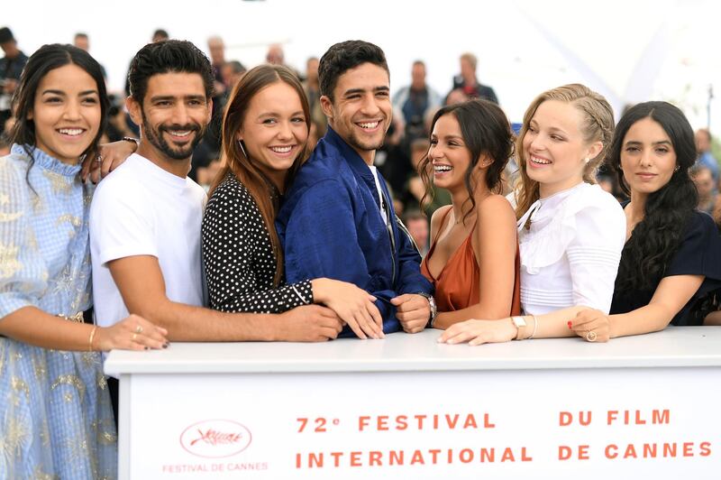 (L-R) Dany Martial, Salim Kechiouche, Lou Luttiau, Shain Boumedine, Meleinda Elasfour, Marie Bernard and Hafsia Herzi attend the photocall for 'Mektoub, My Love: Intermezzo' during the 72nd annual Cannes Film Festival. Photo: Pascal Le Segretain/Getty Images