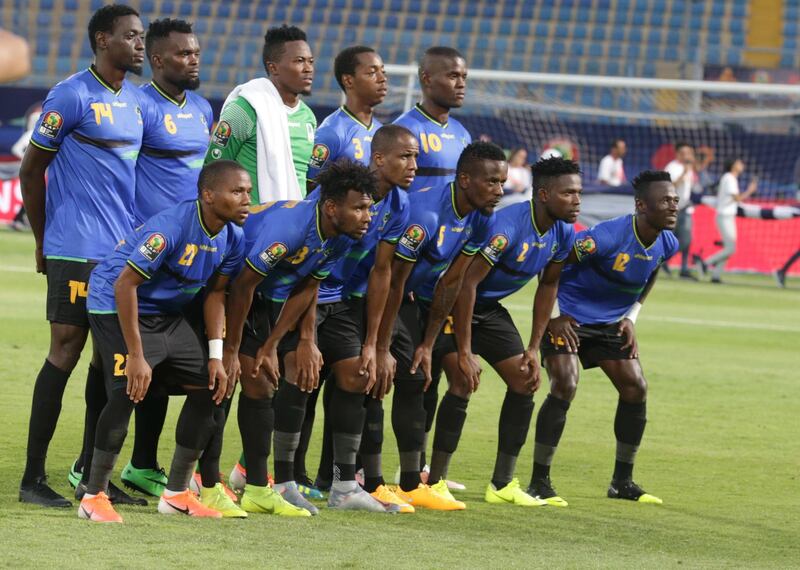 Tanzania players pose before the match. EPA