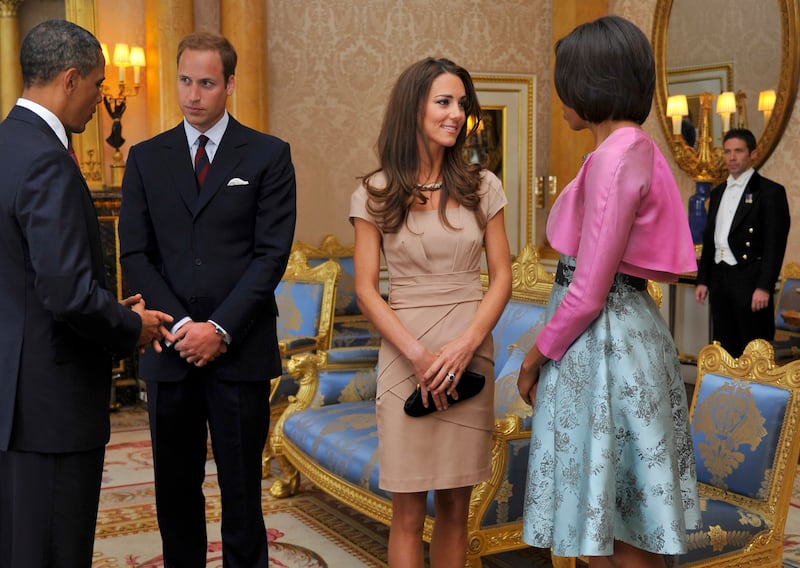 Meeting with former US president Barack Obama and first lady Michelle Obama at Buckingham Palace in London, England, on May 24, 2011. Getty Images