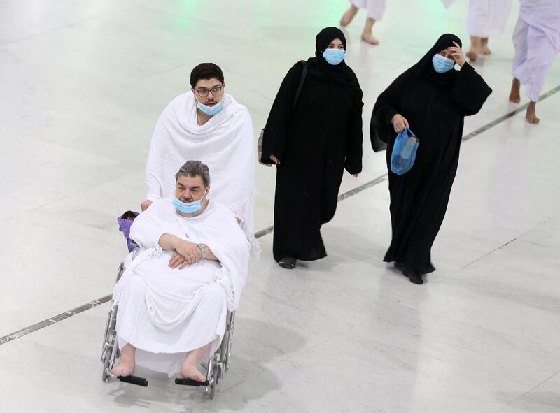Muslim pilgrims wear protective face masks to prevent contracting coronavirus, as they arrive at the Grand mosque in the holy city of Mecca, Saudi Arabia. REUTERS