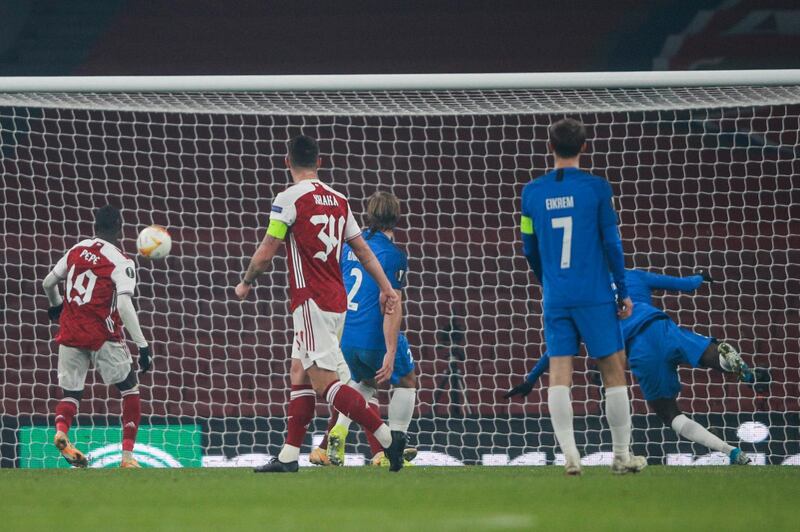 Arsenal's Nicolas Pepe, left, scores during the Europa League match against Molde at the Emirates Stadium. AP