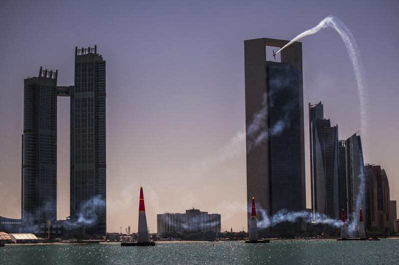 Sonka flies around the Corniche with Nation Towers, Adnoc HQ and Etihad Towers in the background.
