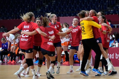 Norway team players react as they won the women's preliminary round group A handball match between Norway and the Netherlands at the 2020 Summer Olympics, Saturday, July 31, in Tokyo, Japan. AP