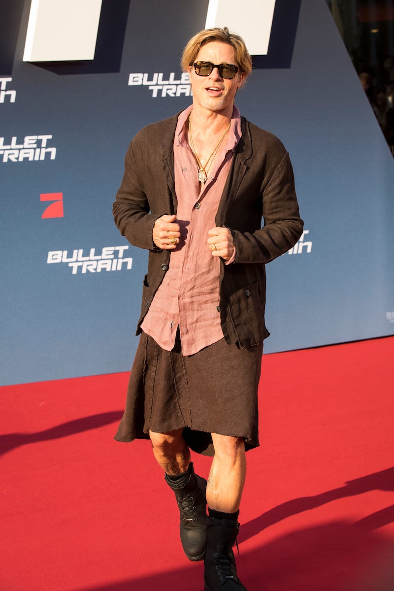 Brad Pitt walks the red carpet. Getty Images 