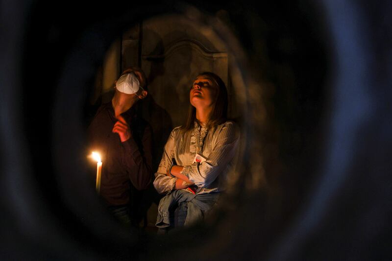 Visitors to the Church of the Holy Sepulchre, in Jerusalem's Old City. All photos by Reuters