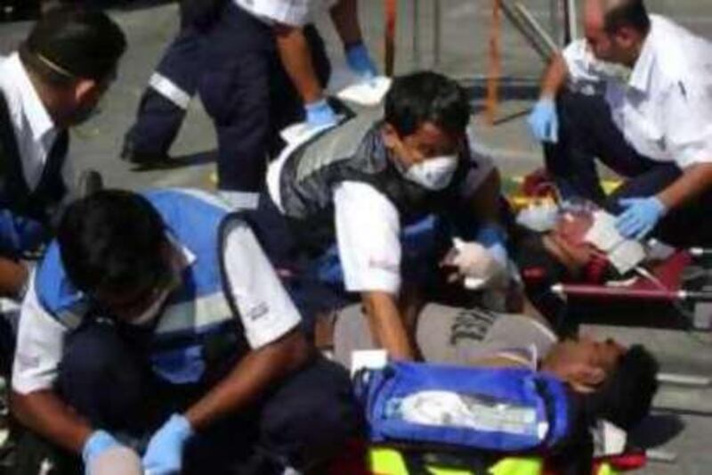 DUBAI UAE. 23 NOVEMEBER 2008. This handout image shows papramedics and extras perofming a Major Incident Drill in Dubai Health Care City