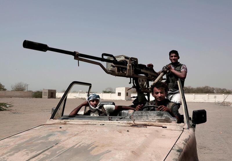 In this Feb. 12, 2018 photo, young Saudi-led backed forces, part of Ahmed Al-Kawkabani's southern resistance unit in Hodeida, patrol al-Khoukha, Yemen. Young men, some as young as 12, have served on the front lines throughout Yemenâ€™s 3-year-old war and as the fight drags on, they now are shattered generation. (AP Photo/Nariman El-Mofty)