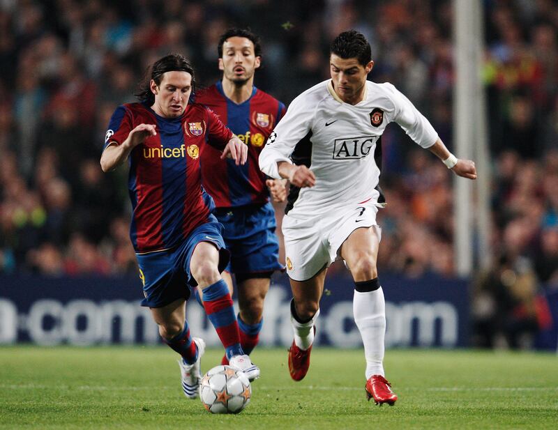 Ronaldo holds off the challenge of Lionel Messi during the Champions League semi-final against Barcelona in 2008. Getty Images