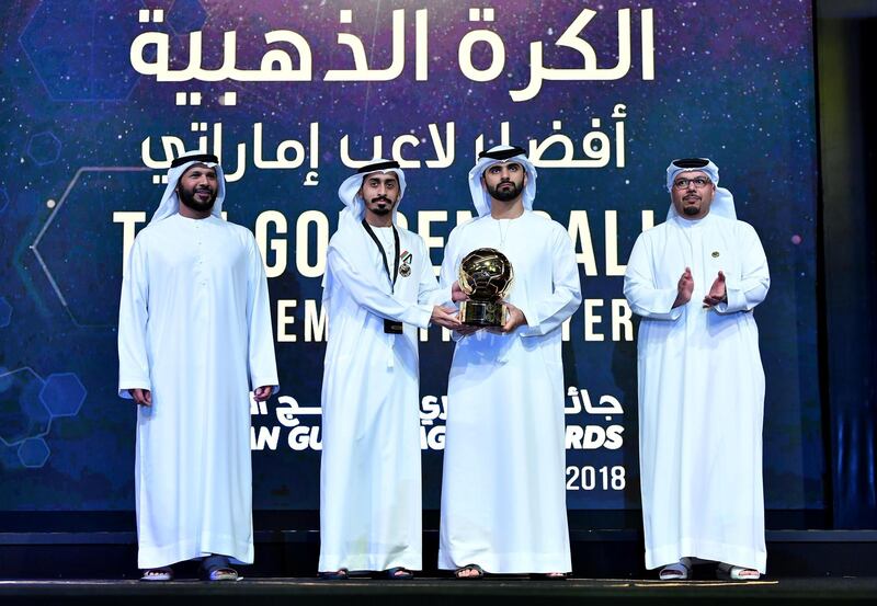 3b - Al Jazira playmaker Khalfan Al Mubarak collects his prize for best Emirati. He was also included in the AGL team of the season.