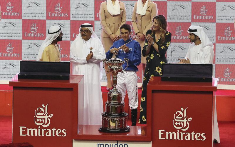 DUBAI , UNITED ARAB EMIRATES , MARCH 30  – 2018 :- Left to Right- Sheikh Mohammed bin Rashid Al Maktoum , Vice President and Prime Minister of the United Arab Emirates, and Ruler of the Emirate of Dubai ,  Sheikh Hamdan bin Rashid Al Maktoum, Deputy Ruler of Dubai and the Minister of Finance and Industry of the UAE ,  Christophe Soumillon and Sheikh Hamdan bin Mohammed bin Rashid Al Maktoum  Crown Prince of Dubai, United Arab Emirates during the trophy presentation ceremony after Thunder Snow ( IRE  ) ridden by Christophe Soumillon ( no  12 ) won the 9th horse race Dubai World Cup 2000m dirt during the Dubai World Cup held at Meydan Racecourse in Dubai. ( Pawan Singh / The National ) For News/Sports/Instagram/Big Picture. Story by Amith/Rupert