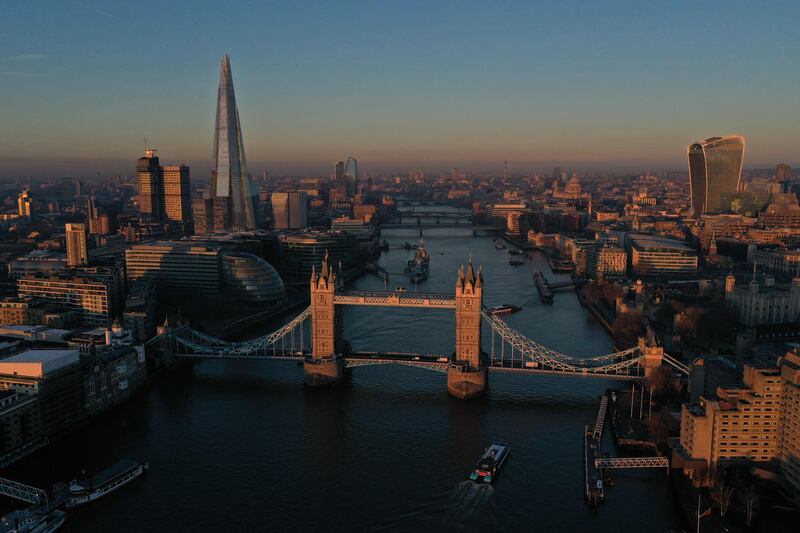 London's Tower Bridge, spanning the Thames, at sunrise. AFP