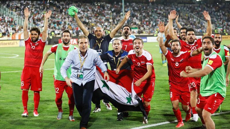 Syria's players after their 2-2 draw against Iran was enough to secure them a play-off spot. Abedin Taherkenareh / EPA