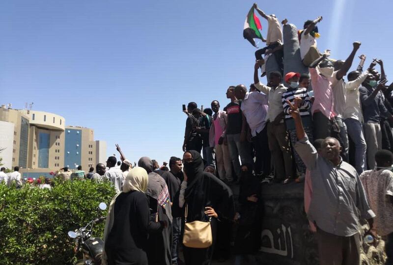 Sudanese demonstrators chant slogans outside the army headquarters in the capital Khartoum. AFP