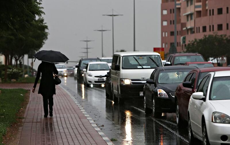 Traffic during the rain at the Discovery Gardens area in Dubai. Pawan Singh / The National 