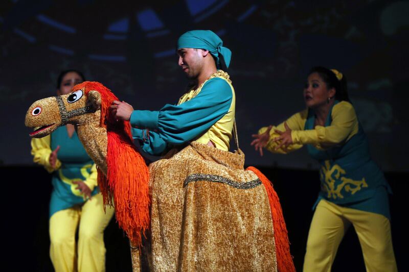 Members of a Kazakhstan group perform in 'The Colours of Asia' show of the State Puppet Theatre of Astana during the Carthage Puppetry Art Days in Tunis, Tunisia. EPA
