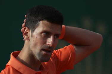 Serbia's Novak Djokovic reacts as he plays Spain's Alejandro Davidovich Fokina during their second round match at the Monte-Carlo Masters tennis tournament, Tuesday, April 12, 2022 in Monaco.  (AP Photo / Daniel Cole)