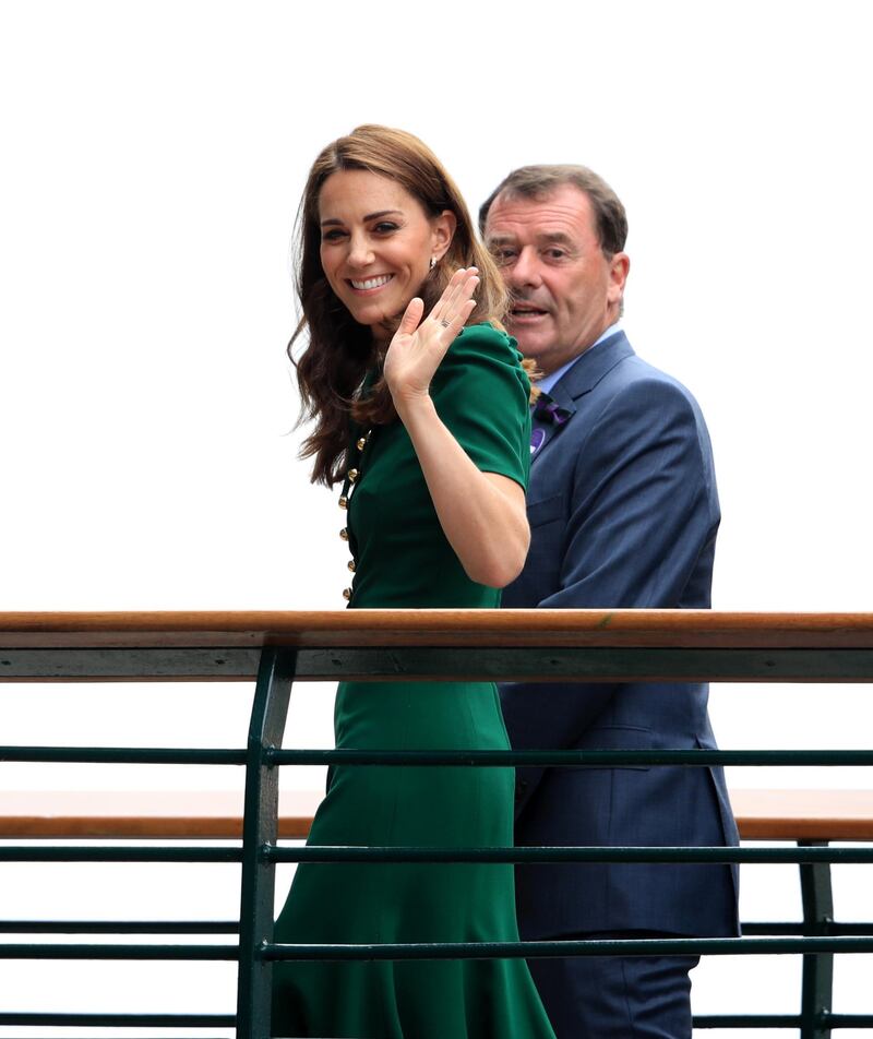 The Duchess of Cambridge arrives on day twelve of the Wimbledon Championships at the All England Lawn Tennis and Croquet Club, Wimbledon wearing a forest green Dolce & Gabanna dress. Photo: PA