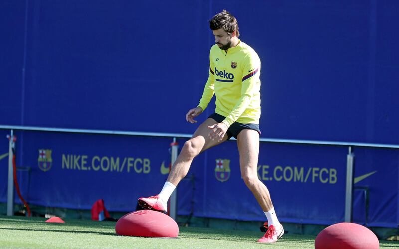 Gerard Pique during a training session at Ciutat Esportiva Joan Gamper. Getty Images