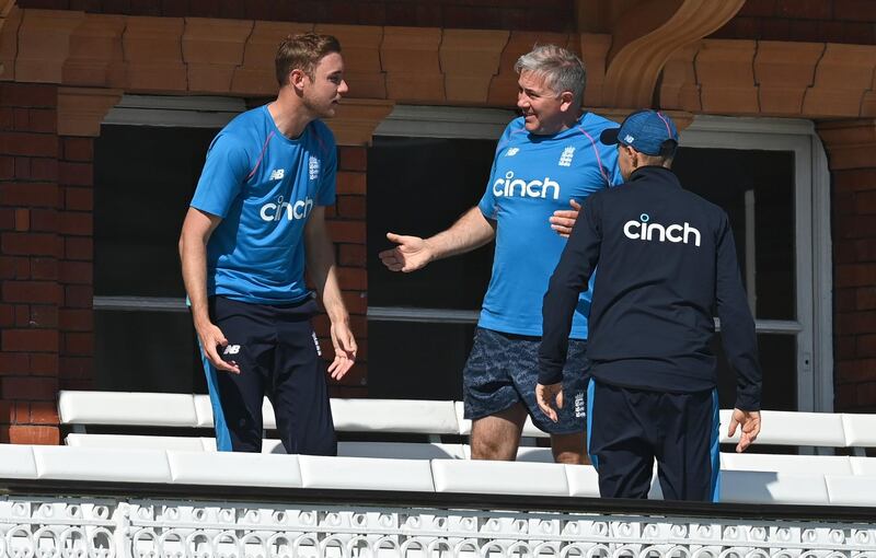 Stuart Broad of England speaks to coach Chris Silverwood and captain Joe Root during training at Lord's. Getty