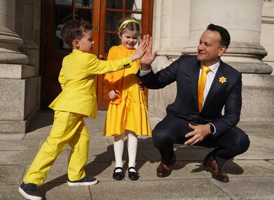 Leo Varadkar high-fives children at an Irish Cancer Society event this month.