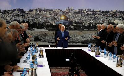Palestinian President Mahmoud Abbas prays at the start of a meeting with the Palestinian leadership in Ramallah, in the Israeli-occupied West Bank December 22, 2018. REUTERS/Mohamad Torokman