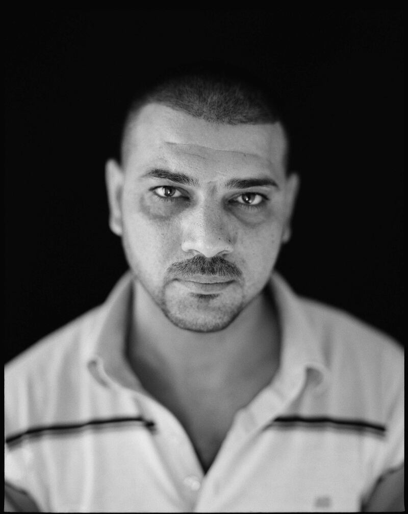 Portrait of Iraqi former detainee. Photo by Chris Bartlett