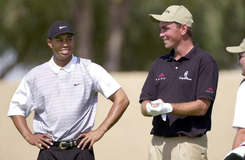 Thomas Bjorn, right, beat Tiger Woods to the 2001 Dubai Desert Classic title. Ross Kinnaird / Getty Images

