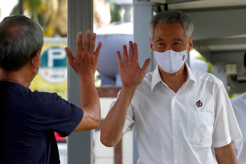 Singapore's Prime Minister Lee Hsien Loong of the ruling People's Action Party arrives at a nomination centre ahead of the general election in Singapore. Reuters