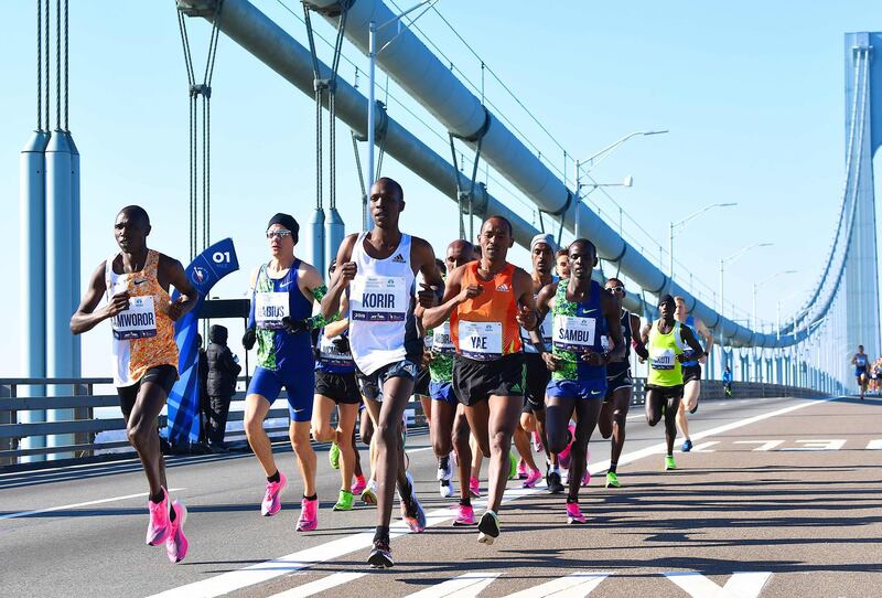 (FILES) In this file photo runners cross the Verrazzano-Narrows Bridge during the 2019 TCS New York City Marathon in New York on November 3, 2019. New York's famed marathon planned for November 1, 2020 has been cancelled due to the coronavirus pandemic, organizers said June 24, 2020. Calling the cancellation "incredibly disappointing," Michael Capiraso, head of the New York Road Runners organization, said "it was clearly the course we needed to follow from a health and safety perspective."
 / AFP / Johannes EISELE

