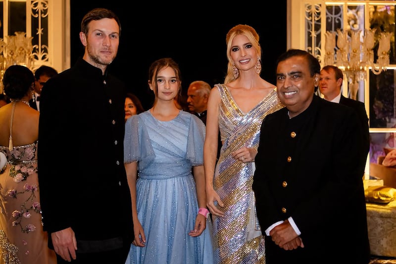 From left, Jared Kushner, daughter Arabella and Ivanka Trump posing with billionaire industrialist Mukesh Ambani