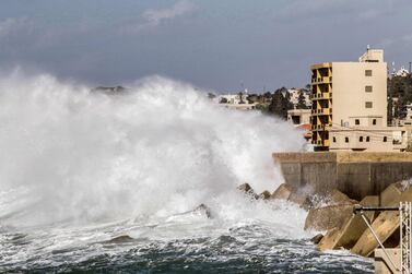 This photo taken on December 24, 2019 shows waves crashing by the fishermen's port in the coastal northern Lebanese town of Batroun, as wind exceeds a speed of 90 kilometres per hour. / AFP / Ibrahim CHALHOUB