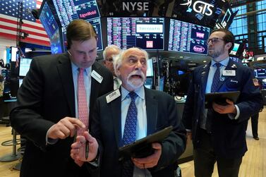 Traders work at the New York Stock Exchange. Major Wall Street indices finished down more than seven per cent on Monday following an ugly session sparked by an oil price crash and fears over the economic fallout of the coronavirus. Reuters