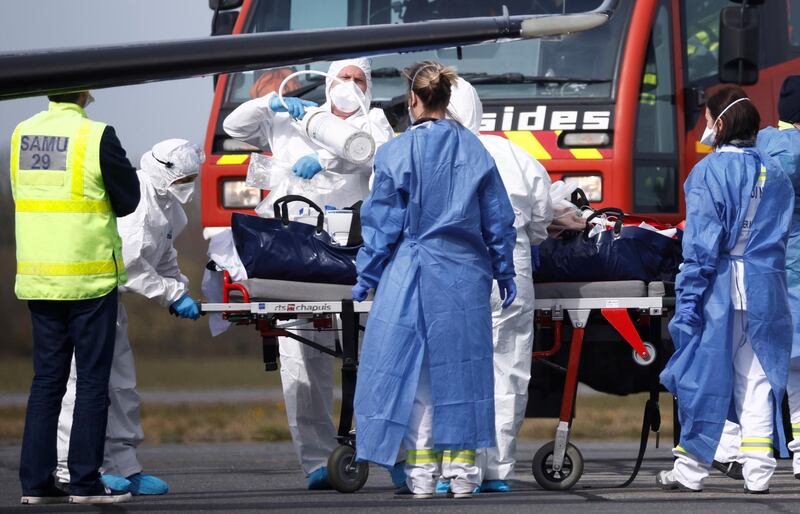 A patient suffering from Covid-19 is transferred from Lille to Brest hospital in France. Reuters