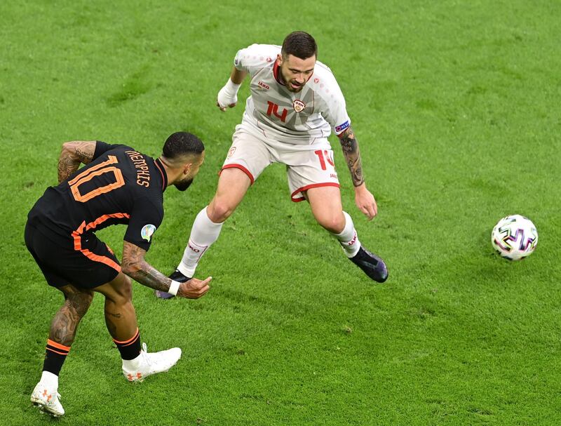 Darko Velkovski - 4: Showed reluctance to challenge Depay before Dutch attacker opened scoring and generally struggled to deal with the Barcelona new boy. One good block on a Berghuis shot in second half. EPA