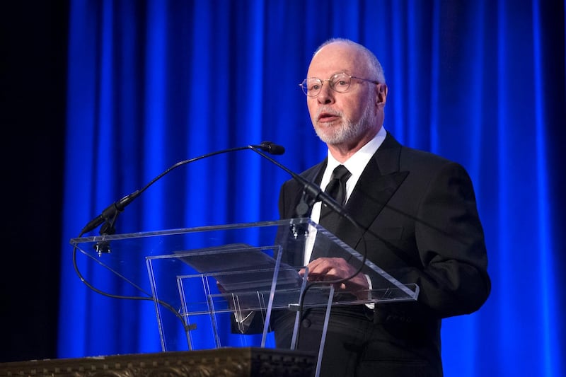 FILE - In this May 12, 2014 file photo, Paul Singer, founder and CEO of hedge fund Elliott Management Corporation, speaks at the Manhattan Institute for Policy Research Alexander Hamilton Award Dinner, in New York. Former owner Li Yonghong missed the deadline of Friday, July 6, 2018 to repay part of a loan worth more than 300 million euros from the U.S.-based hedge fund and Elliott has repossessed the holding company in Luxembourg that Li used to buy seven-time European champion Milan in April 2017.  (AP Photo/John Minchillo, files)
