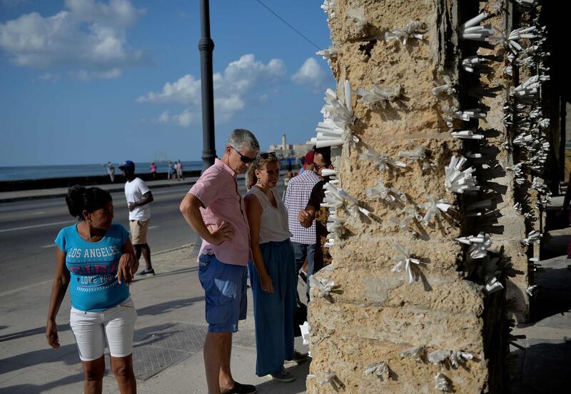 Colonnades have been decorated with papers by Cuban artist Elio Jesus Fonseca. AFP