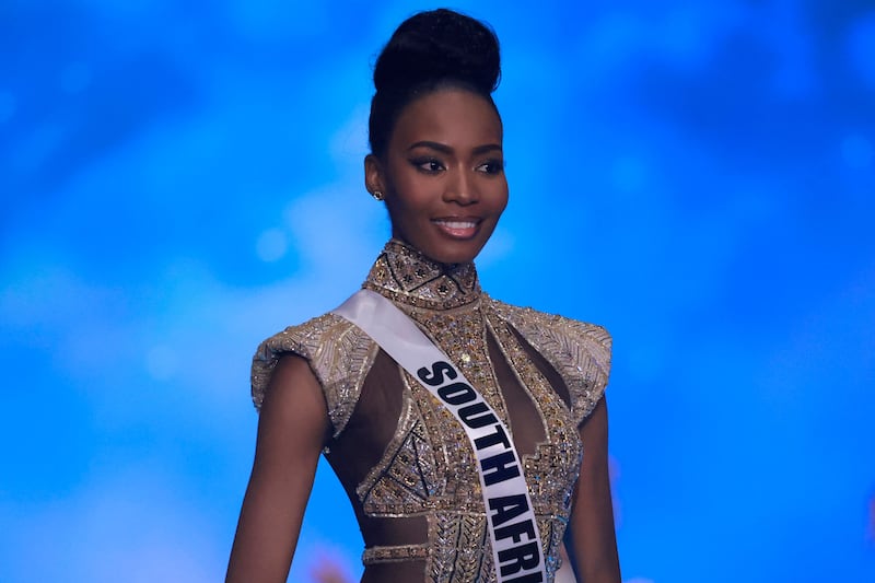 Miss South Africa Lalela Mswane poses in the evening gown competition during the pageant. AFP